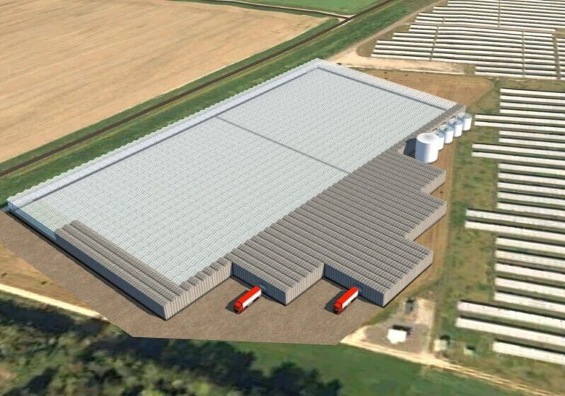 Warehouse surrounded by fields and roads