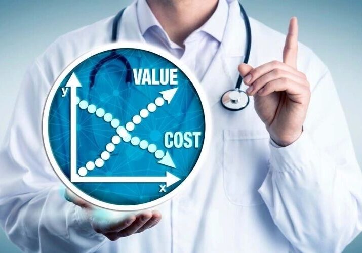 Medical professional with economic diagram
